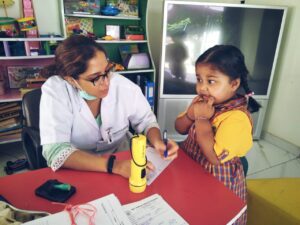 Dr Batra volunteering
